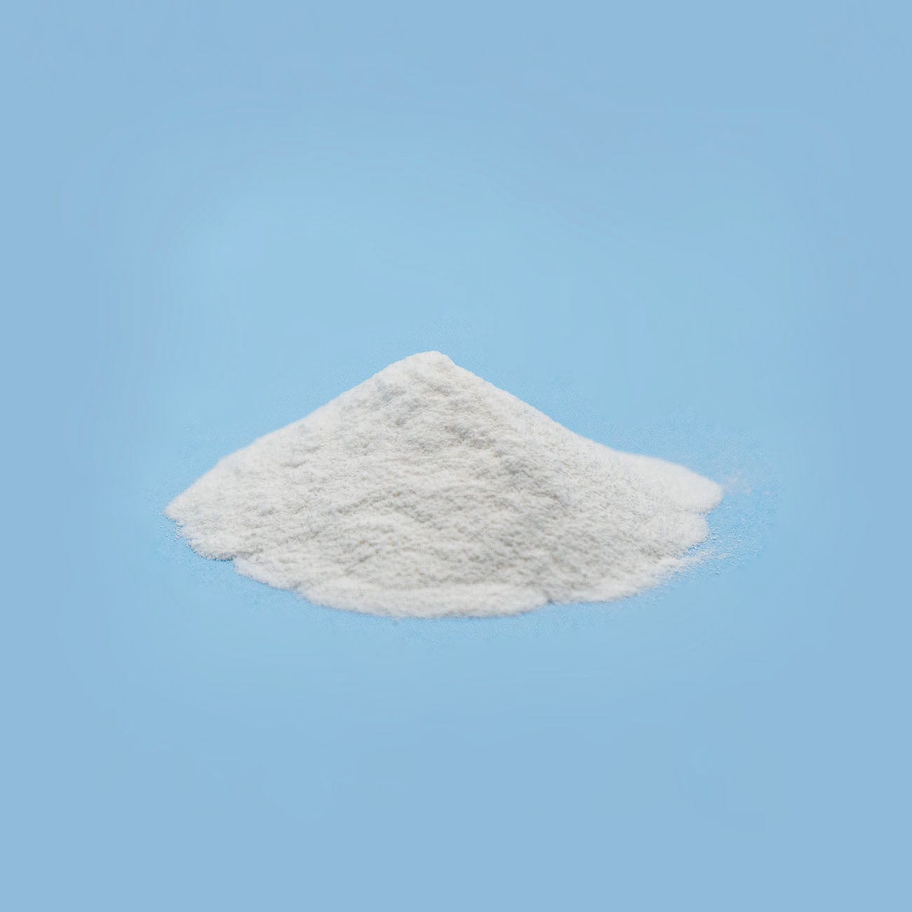 All in one standard-Pile of white All in one standard Powder on light blue background-Excipient-Mix-Granules