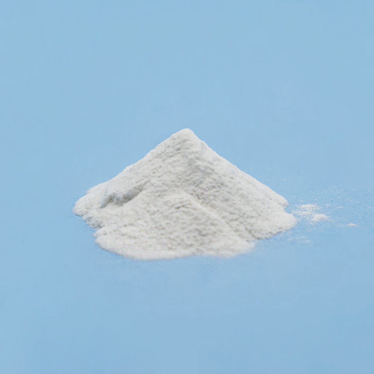 All in one premium-Pile of white All in one premium Powder on light blue background-Excipient-Mix-Granules