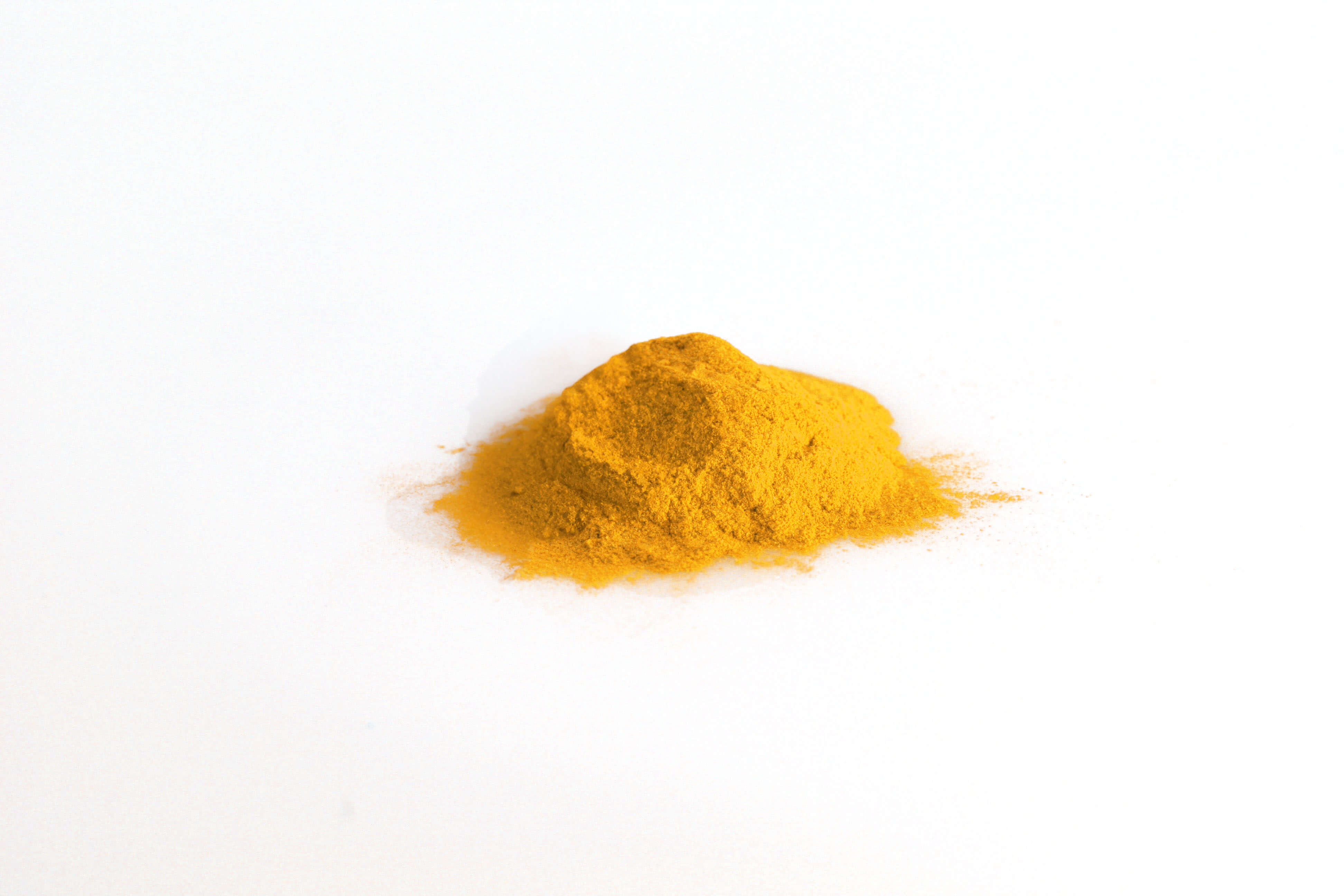 Yellow All in one premium-Pile of Yellow All in one premium Powder on White background-Excipient-Mix-Granules